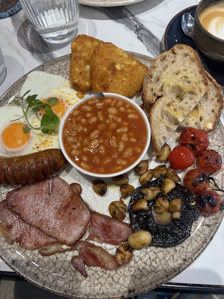 A full English breakfast plate with all the trimmings